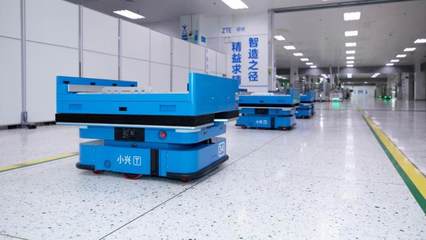 高质量发展调研行丨打开“盲盒”:用5G制造5G的智能工厂究竟什么样？